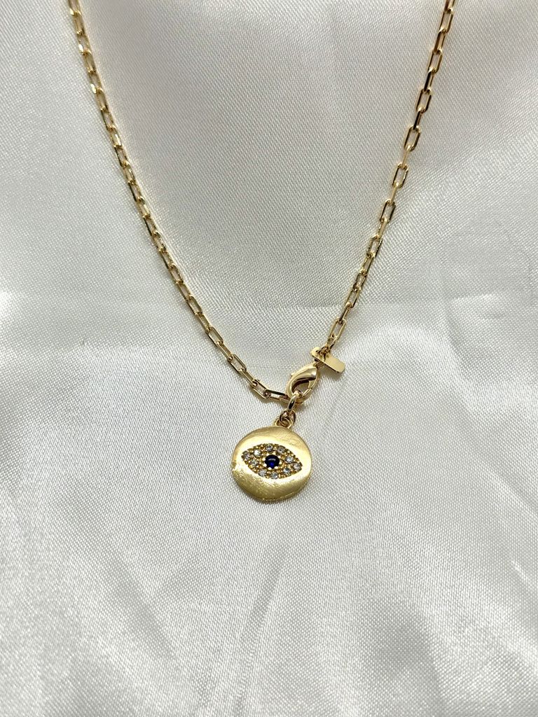 Colar cartier com medalha olho grego
